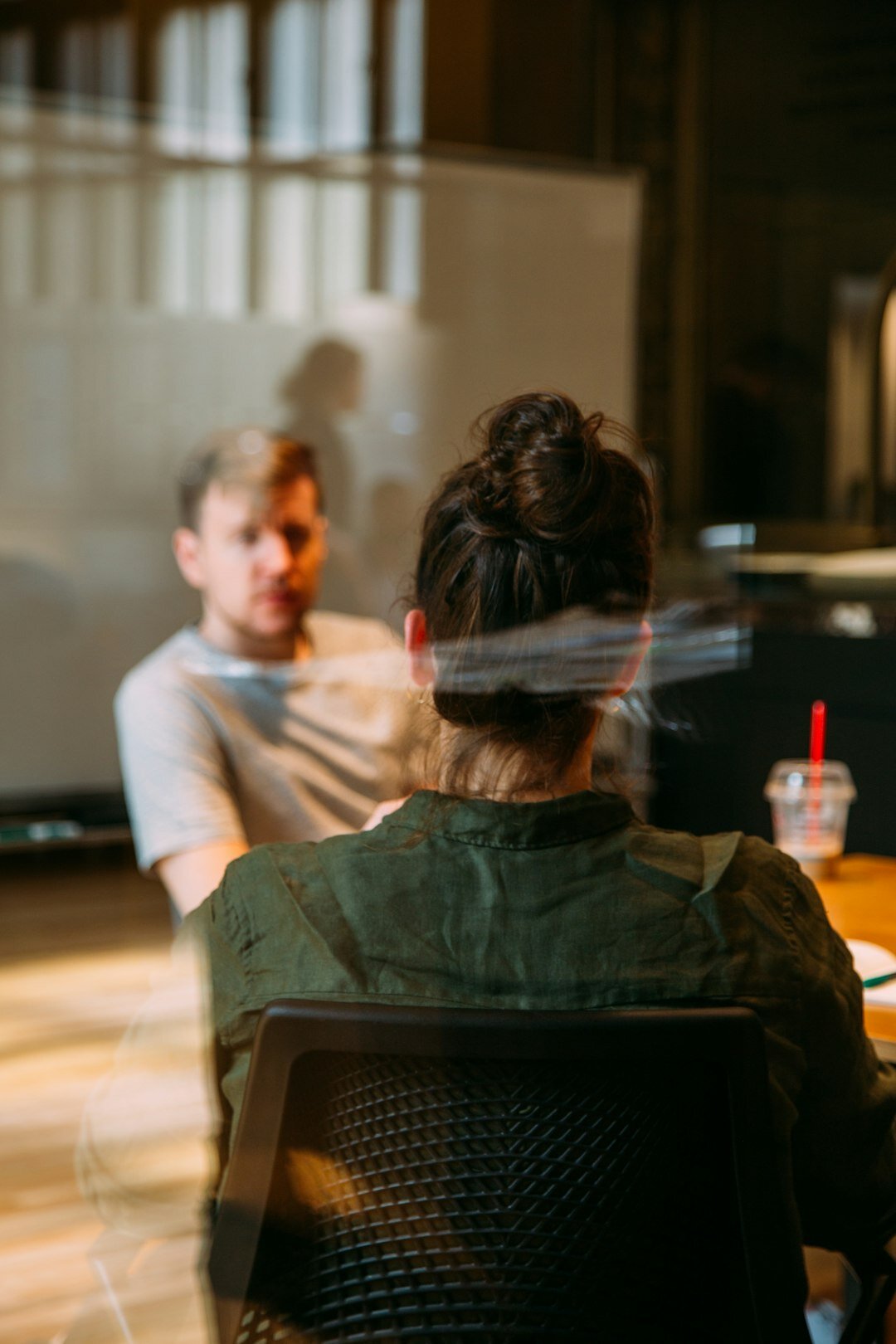 person speaking in meeting